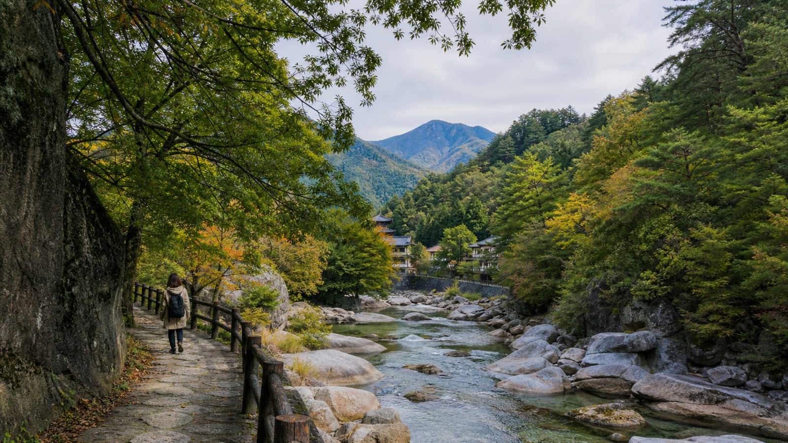 生成AIイメージ画像: 甲府・昇仙峡・身延を巡る1泊2日モデルコース。山梨の渓谷遊歩道と山並み、静かな寺町を思わせる徒歩旅の雰囲気
